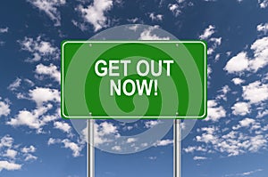 Get out now sign