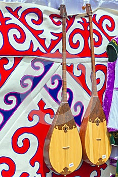 Dombra, a Kazakh national instrument, hangs on the wall of a yur
