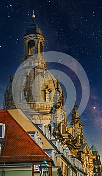 Dome ascent Frauenkirche Dresden against the starry sky. Modern design, contemporary art collage.