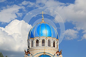 The dome of The Church of the Life-Giving Trinity in Moscow against a blue sky