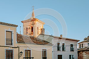 Dome of the church between the roofs of the houses