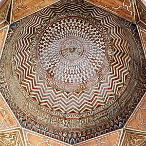 Dome decorated with colorful patterns at Mamluk era public historic Sultan Barquq Mosque, Cairo