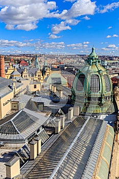 The dome of the FOK Symphony Orchestra against the backdrop of the roofs of Prague buildings