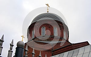 Dome with gilded cross, detail, of the Old Believers Church of the Intercession of the Holy Mother of God, Moscow, Russia photo