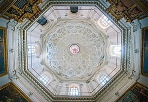 The dome with `God the Father` by Francesco Cozza, in the Church of Santa Maria della Pace in Rome, Italy.