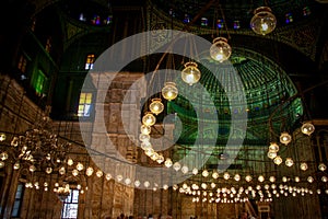 Dome and hanging lights inside the Alabaster Mosque in Cairo