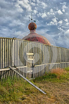 Dome of the lighthouse behind the fence