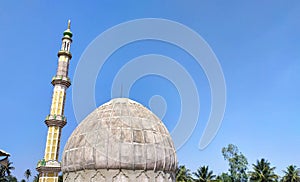 Dome and Minaret of mosque photo