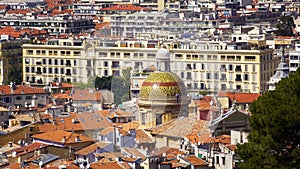 Dome Of Nice Cathedral among rooftops, tourism on French Riviera, architecture