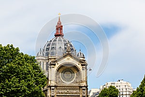 The dome of Saint-Augustin church in Paris, sunny spring day