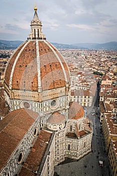 The dome of the Cattedrale di Santa Maria del Fiore Florence Cathedral in Piazza del Duomo as seen from the Giotto`s Campanile
