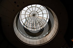 Dome skylight with view of a tall building