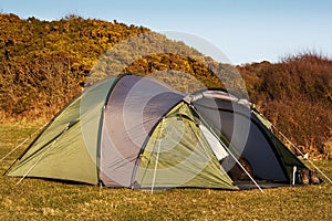 Dome tent pitched in field