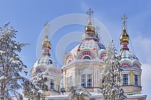 Domes of Ascension Cathedral in snow-covered in Panfilov Park, Almaty, Kazakhstan.
