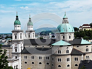 Domes of churches overlooking the mountains Salzburg.