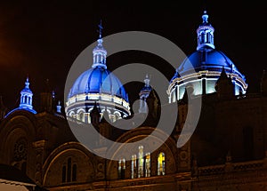 Domes of the New Cahtedral Catholic Church are illuminated in Cuenca, Ecuador