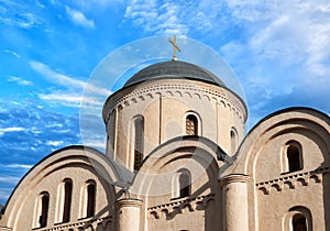 Domes of the Pyrohoshcha Dormition of the Mother of God Church on Podil against the blue sky in Kyiv