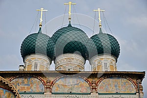 Domes of Resurrection Cathedral of 17th century on right bank of Volga river in summer in Tutayev, Yaroslavl region, Russia