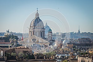 The domes and rooftops of the eternal city, the view from the Spanish steps, Rome, Italy, sunny day and blue sky