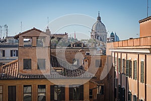 The domes and rooftops of the eternal city, the view from the Spanish steps, Rome, Italy, sunny day and blue sky