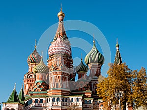 Domes of St. Basil`s Cathedral on a sunny autumn day. Red Square, Moscow, Russia. Close-up