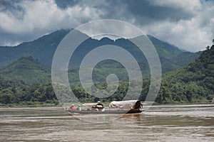 domestic boat sailing in maekong river luang prabang northern of laos