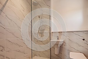 Domestic cloakroom with shower cubicle