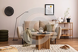 Domestic and cozy interior of living room with beige sofa, plants, shelf, coffee table, boucle rug, mock up poster frame, side