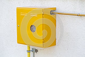 Domestic gas meter on wall outside