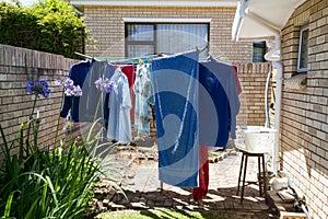 Domestic scene: washing hanging on the line in full sun George South Africa