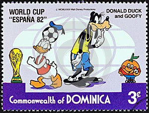 DOMINICA - CIRCA 1982: A stamp printed in Dominica shows Donald Duck and Goofy looking for ball, circa 1982.