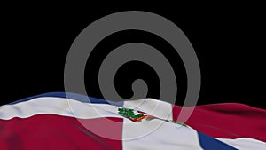 Dominican Republic fabric flag waving on the wind loop. Dominican Republic embroidery stiched cloth banner swaying on the breeze.