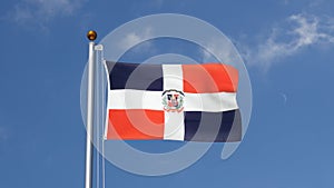 Dominican Republic flag flying on a flagpole