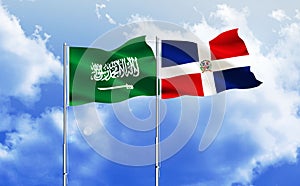 Dominican Republic and Saudi Arab flags together waving against blue sky