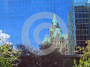 Ottawa, Ontario, Dominion Building reflected in Glass Fascade of Bank of Canada Building photo