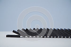 Domino effect background template. Planks falling down, copy space. Financial crisis. Total collapse, place for text