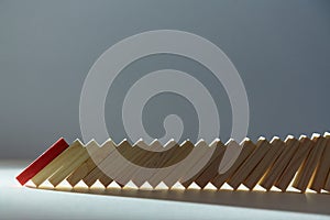 Domino effect mockup template on dark shadows background. Total collapse, economic crisis, copy space. Falling domino