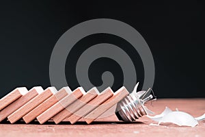 Domino effect shatter the light bulb photo