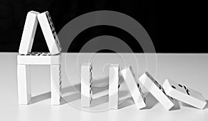 Domino house falling