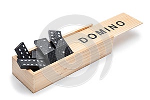 Dominoes, randomly placed in a box.