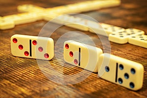 Dominoes tiles on vintage table