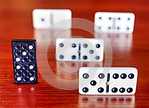 Dominoes on wooden board