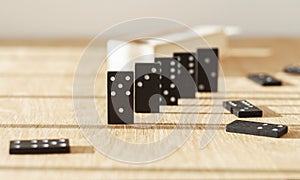 Dominos game pieces on wood table