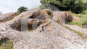 domus de janas and necropolis of santu pedru ancient nuragic tombs photo