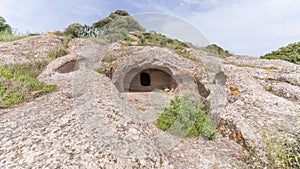 domus de janas and necropolis of santu pedru ancient nuragic tombs photo