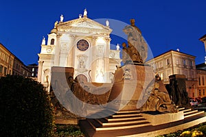 Don Bosco statue at dusk