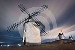 Don Quixote windmills at night. Famous landmark in Consuegra, Toledo Spain.