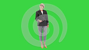 Don't do like that young man Serious-looking strict business lady on a Green Screen, Chroma Key.