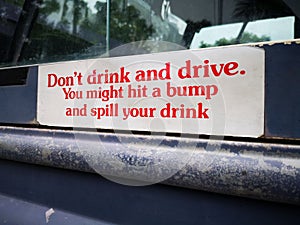 Don`t drink and drive. You might hit a bump and spill your drink.