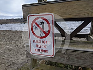 Don`t Feed Waterfowl sign on the back of a lifeguard stand at Juanita Beach Park